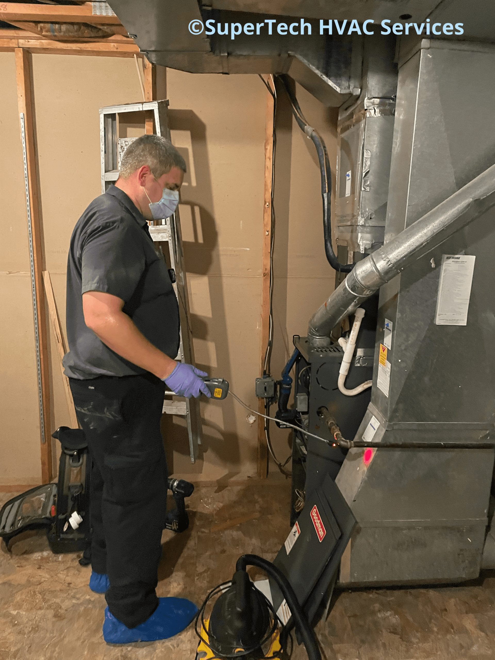 Charlie checking for gas leak Charlie checking for gas leak during a furnace tune up