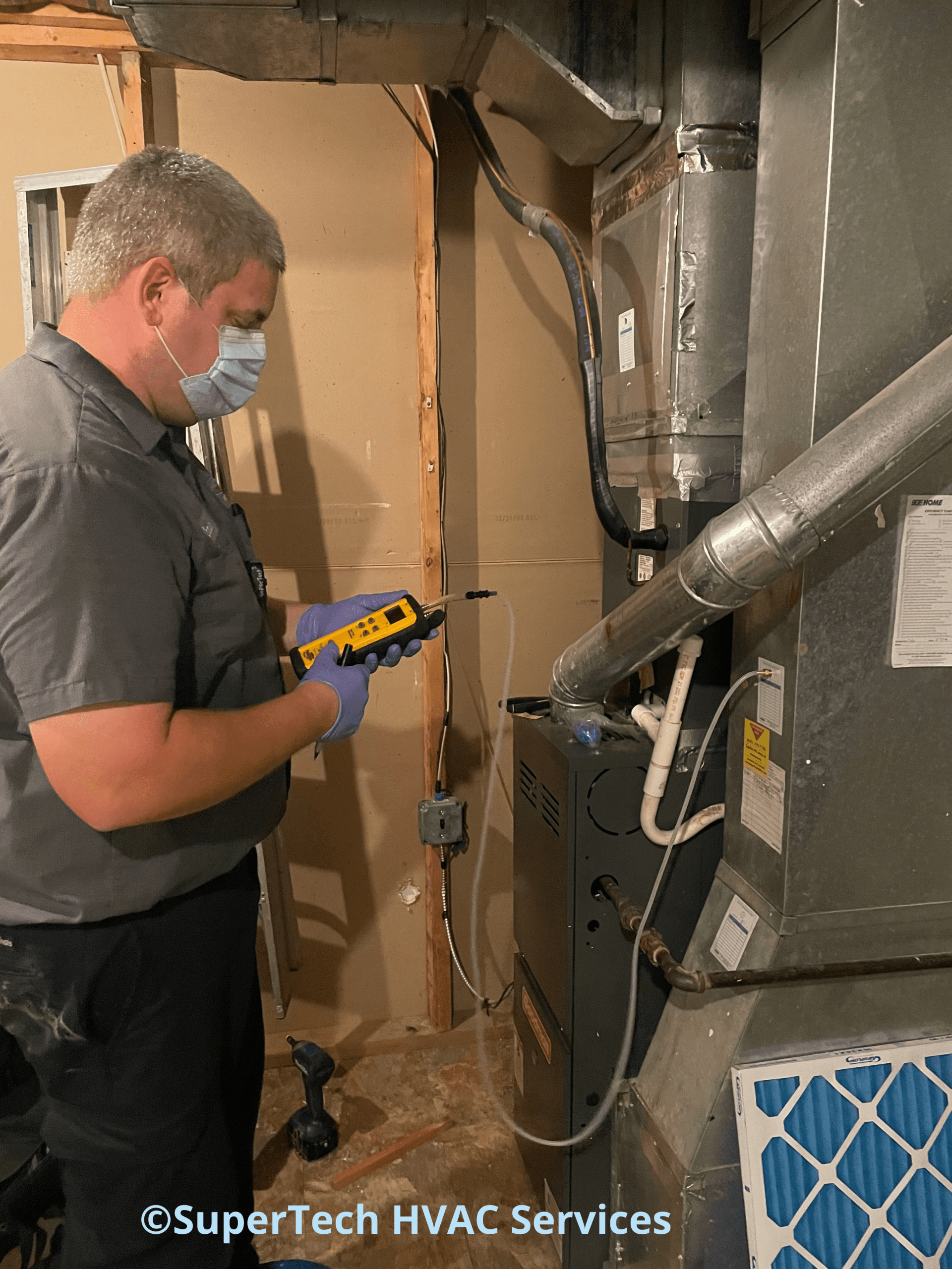 Cockeysville 729394 checking static pressure checking static pressureduring a furnace tune up.