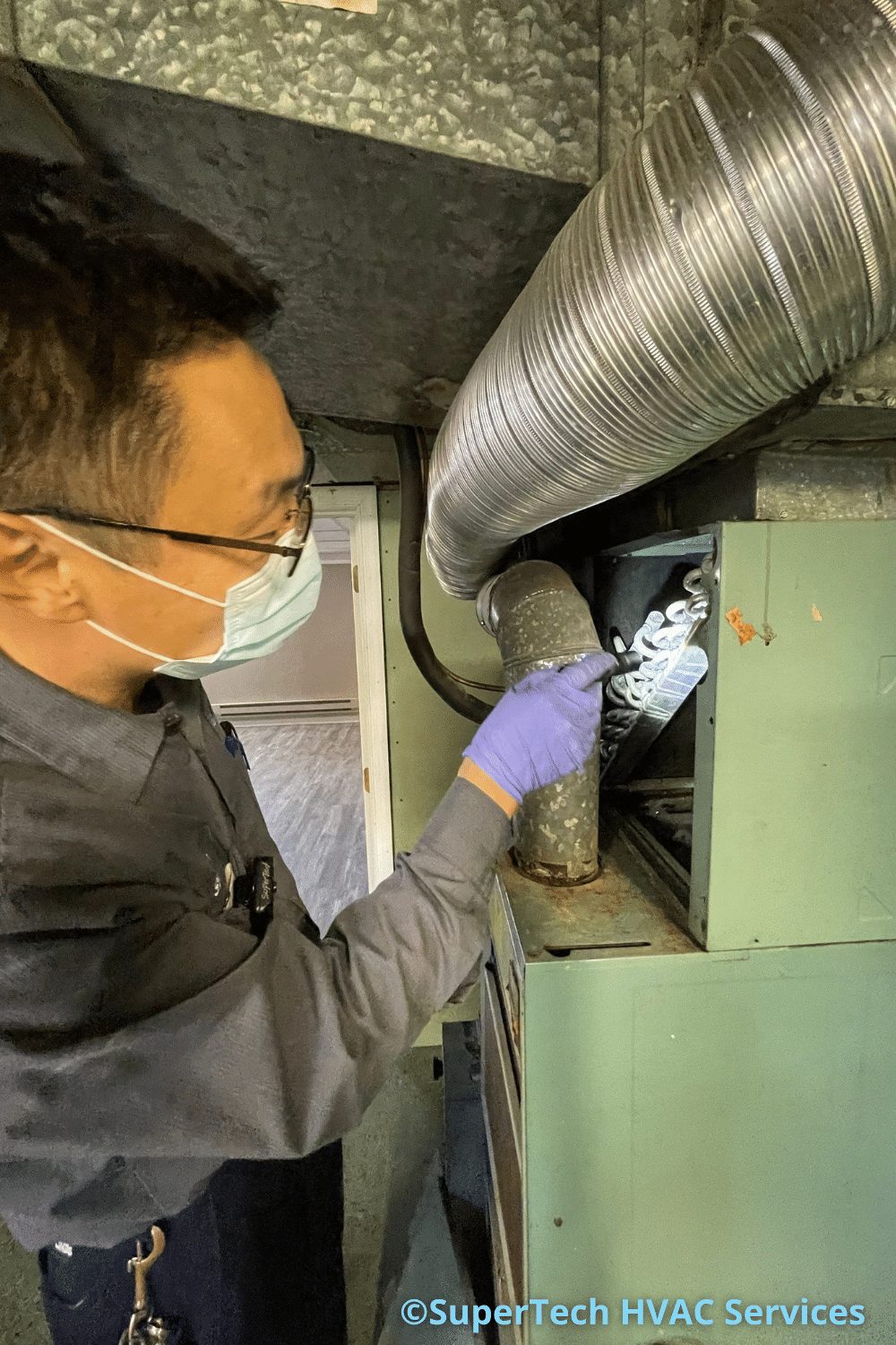 examining evaporator coil during ac tune up examining evaporator coil during ac tune up